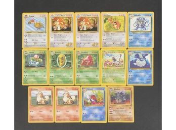 Lot Of 14 Assorted Pokemon Cards
