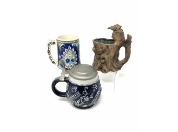 Carved And Painted Mug Collection Including A Grumpy's Bird Over Human Mug From 1975