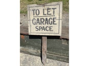 Antique Garage Advertising Sign On Wooden Pole