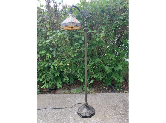 Floor Lamp With Stained Glass Shade And Floral Scroll Work And Foot Button