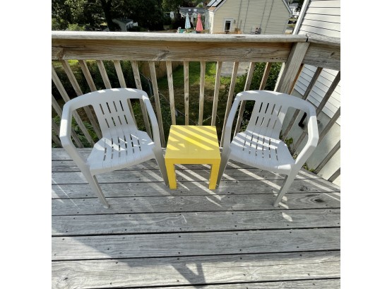 Patio Furniture With Two Plastic Chairs And Fun, Bright Side Table!