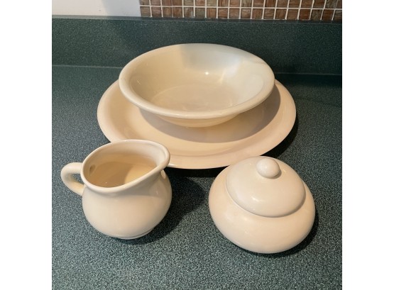 Marked Stoneware Lot With Creamer, Sugar Bowl, Large Bowl And Round Platter