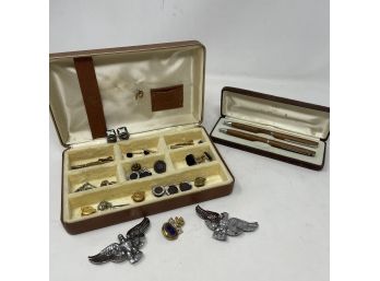 Collection Of Cufflinks And Pins In Dresser Caddy