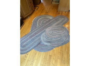 Group Of Various Sized Braided Rugs