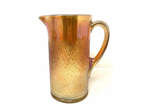 Carnival Glass Pitcher In Marigold