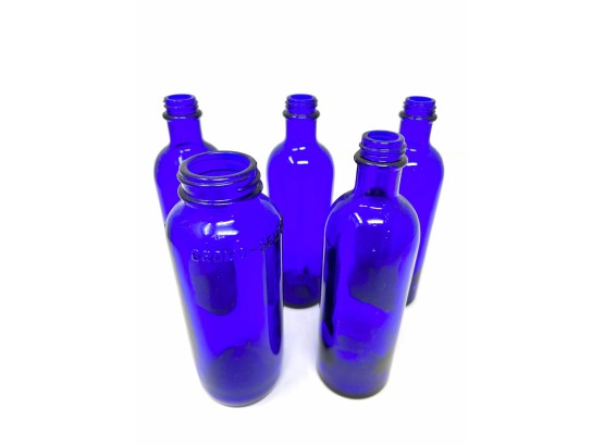 Collection Of Cobalt Blue Glass Bottles