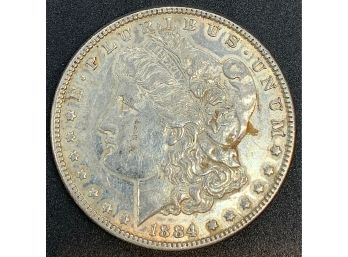 1884 Morgan Head Silver Dollar