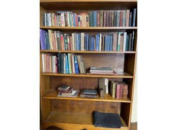 Antique Bookshelf Filled With Antique And Contemporary Books