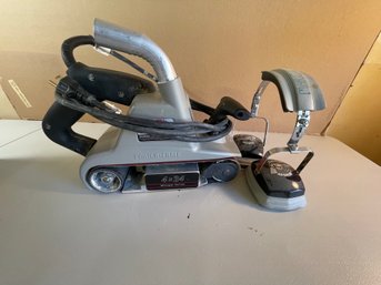 G35 Porter Cable Belt Sander And Headphones