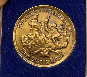 1970'S WALT DISNEY PRODUCTIONS PIRATES OF THE CARIBBEAN MEDALLION COIN IN CASE