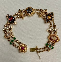 14kt Gold And Precious Stone Charm Bracelet