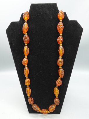 FINELY CARVED ASIAN AMBER AND TIGERS EYE NECKLACE WITH SPIRITUAL GODS