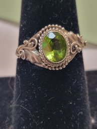 Oval Whirl Dotted Accent Peridot Sterling Silver Ring