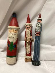 Three Carved Santas