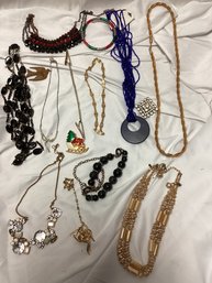 Jewelry Lot - Necklaces, Brooches, And More