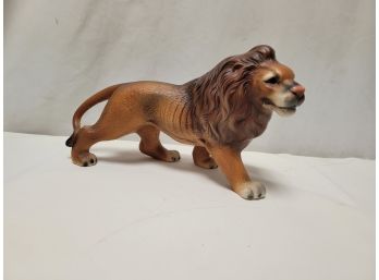 Two Lion Figures