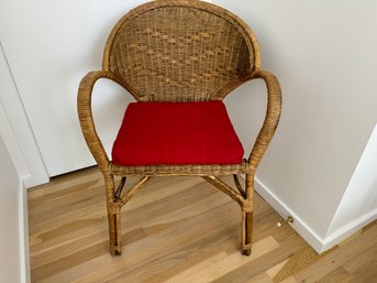 Wicker Arm Chair With Red Cushion