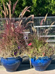 Pair Of Glazed Blue Planters With Plants And Flowers