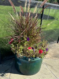 Single Green Glazed Ceramic Planter With Plant And Flowers