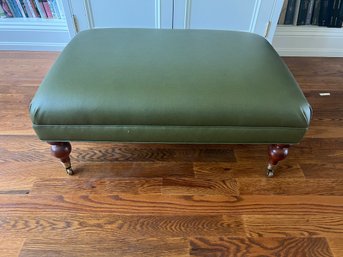 Low Leather Upholstered Ottoman On Castors