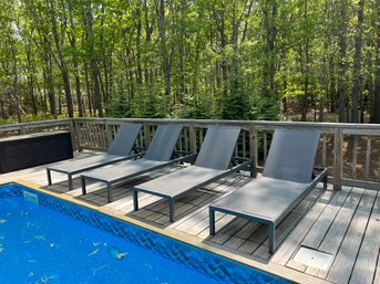 Set Of Four Mesh And Metal Outdoor Chaise Lounges