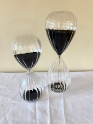 Pair Of Decorative Glass Hour Glass Capsules With Black Sand