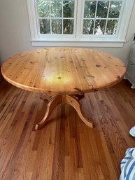 Round Pine Pedestal Dining Table