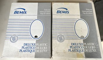 2 New Bemis 1200TC Elongated Toilet Seats - In White & Biscuit