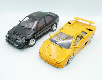 Pair Of 1/18 Scale Diecast Cars - Bburago Lamborghini & Auto Art Mitsubishi Lancer
