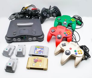 Vintage Nintendo 64 Video Game System, 4 Controllers, And 2 Games