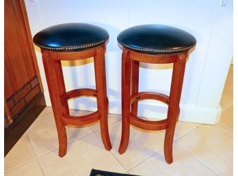 Pair Of Wood And Leather Backless Bar Stools