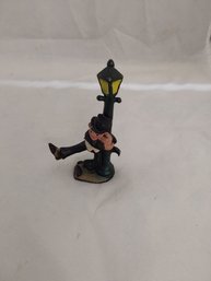 Antique Iron Man Holding Lamp Post Figurine