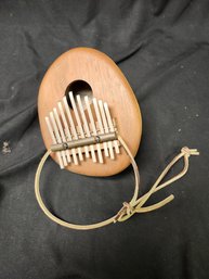 Primitive Cannonball Gourd Thumb Piano Kalimba Musical Instrument
