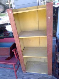 Red And Yellow Primitive Shelving Unit
