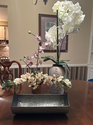 Pretty Lot Of Artificial Flowers Orchid In A Vase Flowers In A Pot And Flowers On A Metal Basket