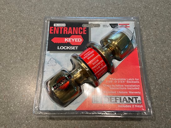 Defiant Polished Brass Locking Entrance  Doorknob - New Keyed Lock Set