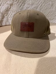 Vintage Stussy Brown Khaki  With Leather Patch Snap Back Baseball Hat The Sticker Is Still Attached