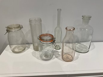 Lot Of Assorted Glass Canisters Bottles And More
