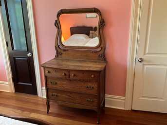 Antique 4 Drawer Solid Wood Carved Dresser With Harp Mounted Mirror