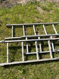 Lot Of 2 In Sections Separate 24 Foot Aluminum Extension Ladders