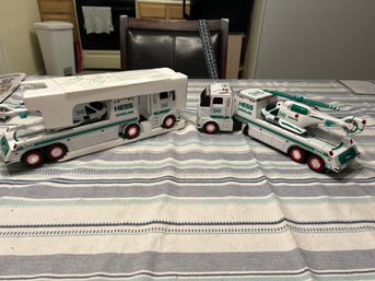 Pair Of 2006 Hess Trucks With Helicopters Excellent Shape. One Box Is In Poor Shape One Without Box