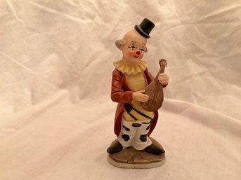 Vintage UC&gC Ceramic Hobo Clown Figurine Playing Lute Musical Instrument 6.75 Inch