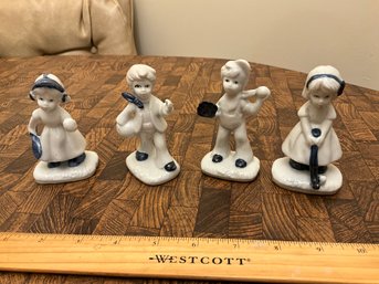 Set Of 4 Vintage Blue And White Porcelain Sports Figurines