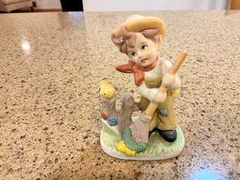 Vintage Sweeping Little Boy Figurine