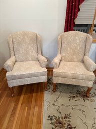 Set Of 2 Cream Colored Floral Upholstered Wing Back Chairs