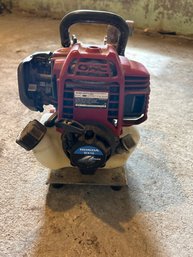 Honda 4 Stroke Gas Powered Water Pump. Has Compression Was Not Tested But Has Lopers Claim Tag Attached