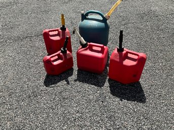 Lot  Of 5 Gas Cans. Assorted  Sizes.