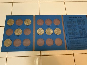 7  Eisenhower Dollars In Collectors Book Coin Collectors Book