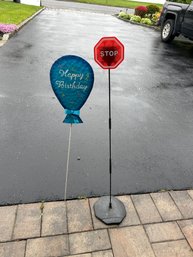 Stand Up Stop Sign And Metal Happy Birthday.