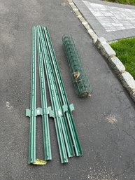 Lot Of 6 New 6 Ft Metal Fence Poles And Small Piece Of Green Fence